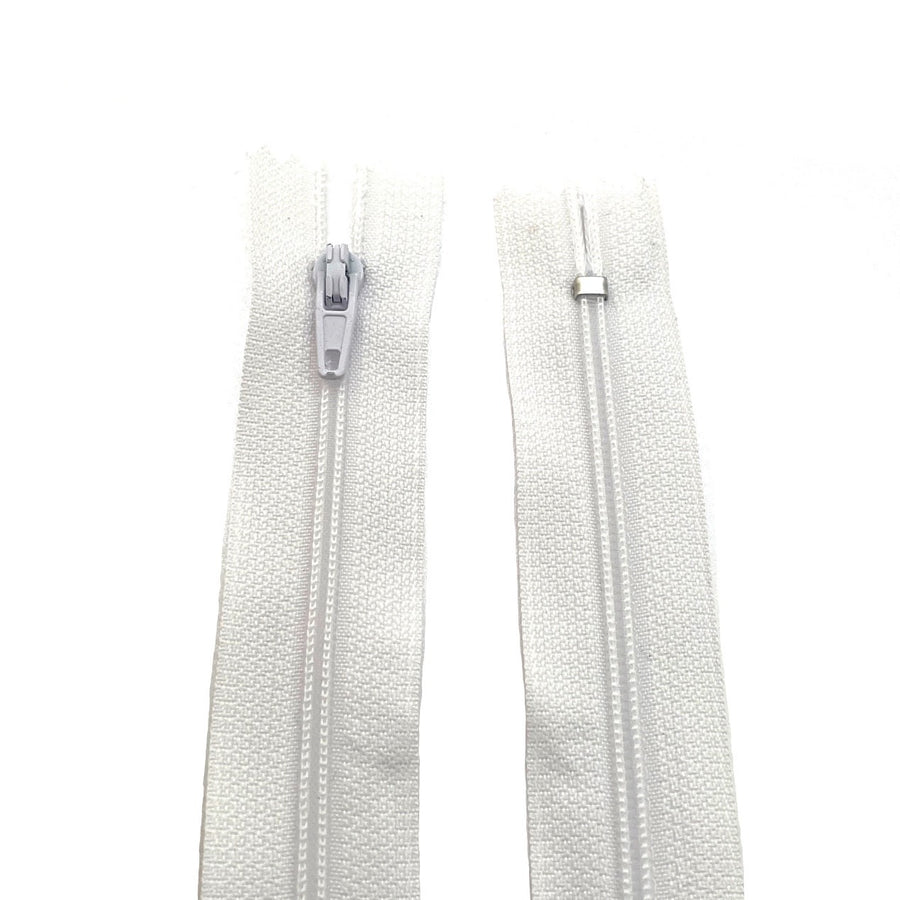 Photo of white nylon zips available in 25 colors and 5 sizes. Excellent quality zippers for craft and dressmaking purposes. Perfect for dresses, skirts, trousers, bags, purses, cushions, and numerous other projects. So many possibilities, so little time!
