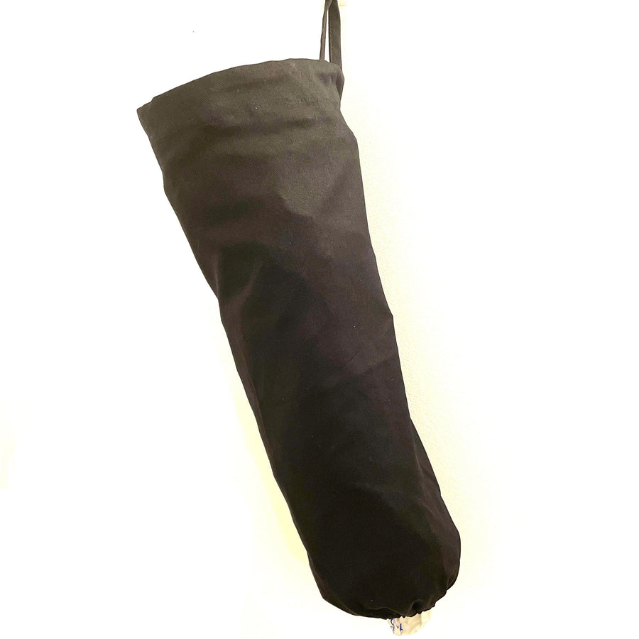 Elasticated bottom of the plastic bag holders in black drill fabric