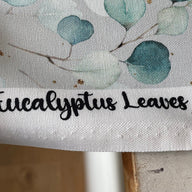 this stunning digitally printed 100% cotton&nbsp;eucalyptus leaves design on a light grey/silver background canvas &nbsp; It is a hardwearing Cotton woven canvas fabric, ideal for clothes, canvas bags, upholstery