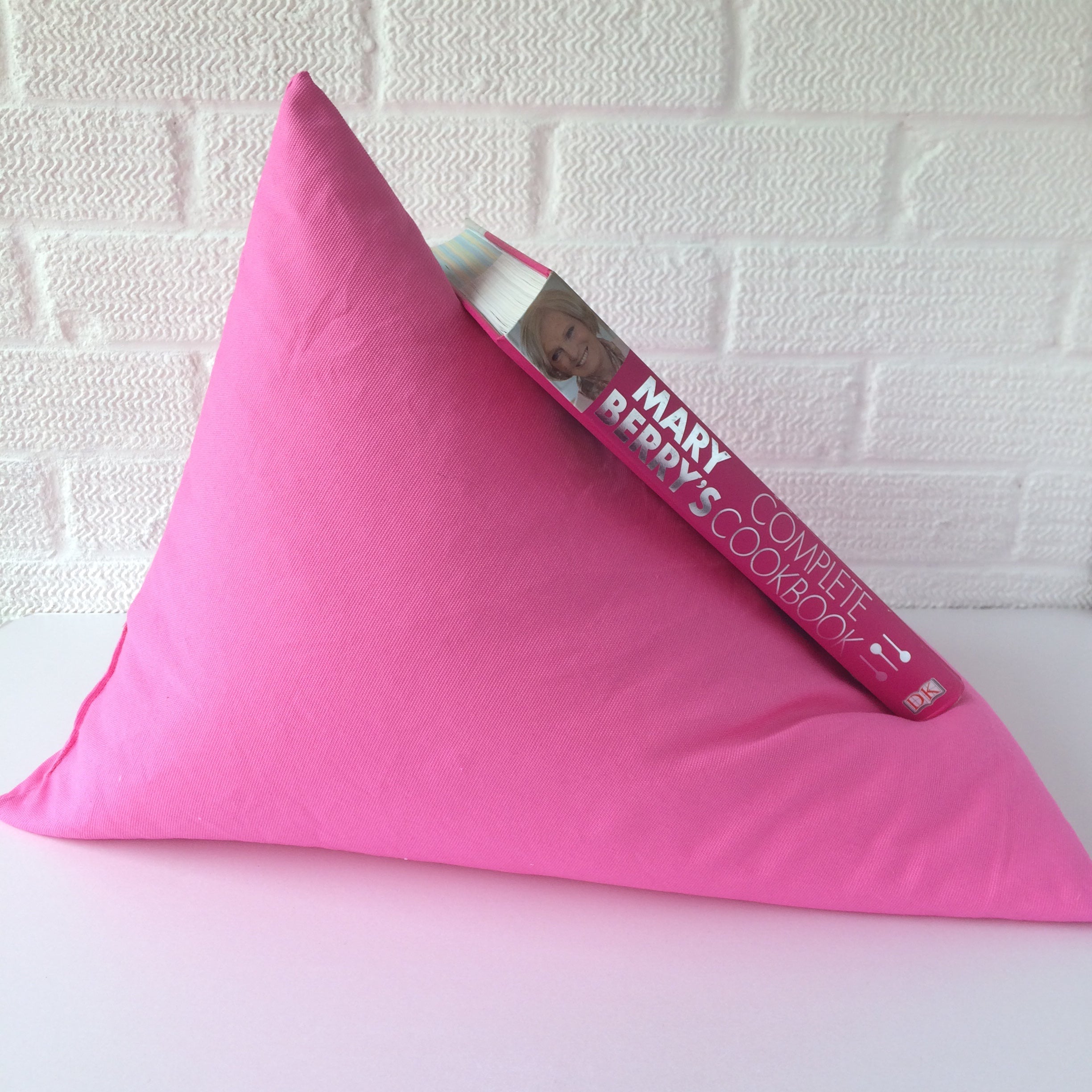 cerise pink canvas book holder in the bean bag style
