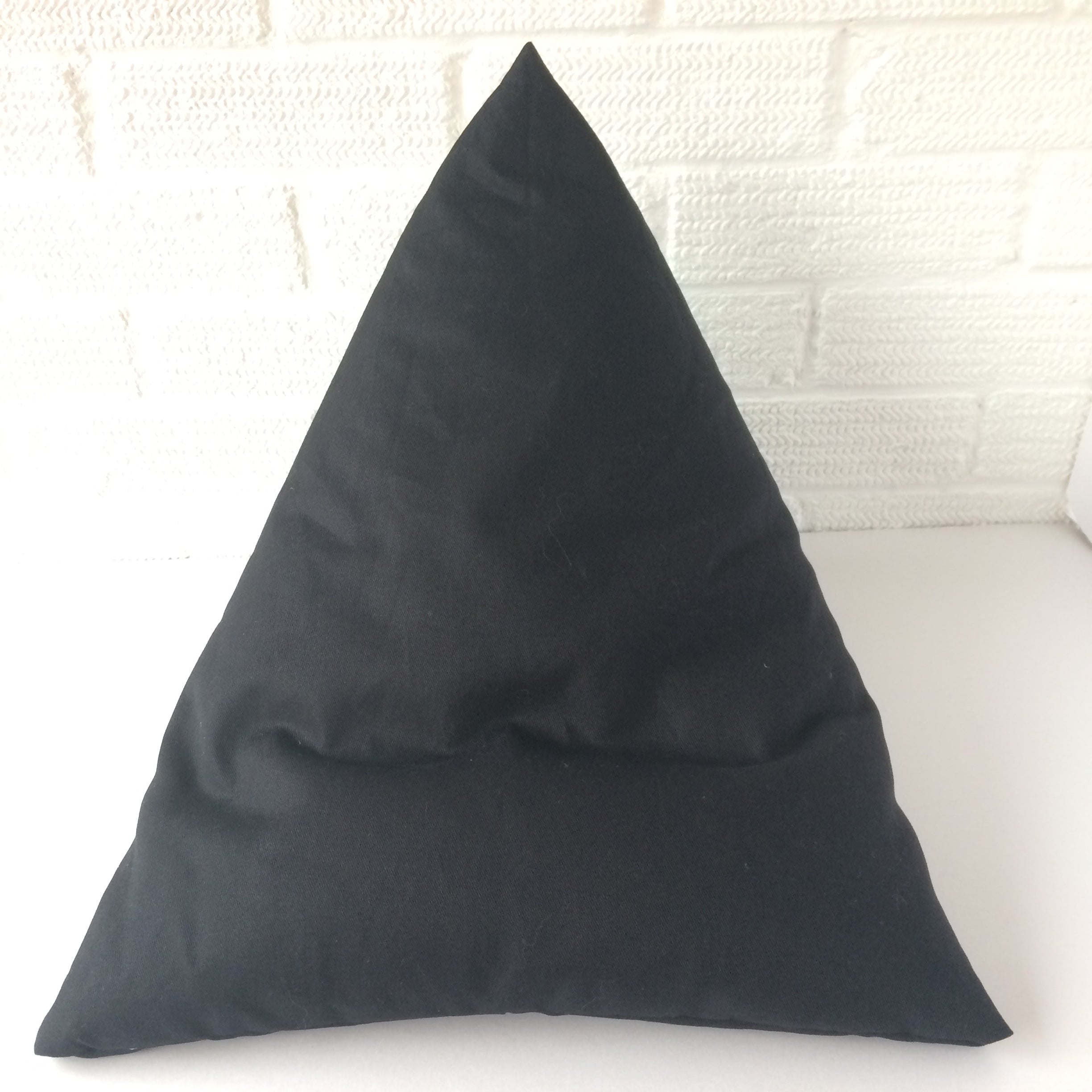 Black drill fabric Book holder bean bag style to hold your books where ever you need them.