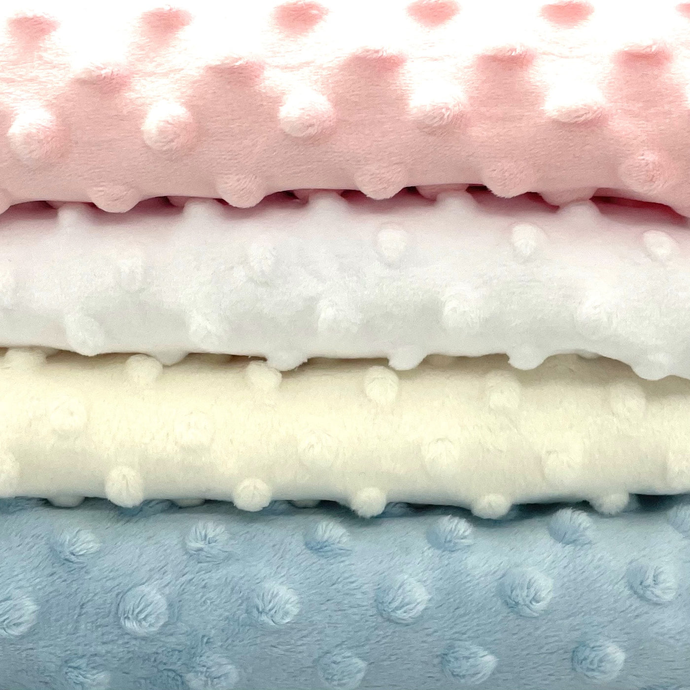 Fat quarter bundle of four colours of dimple fleece.
