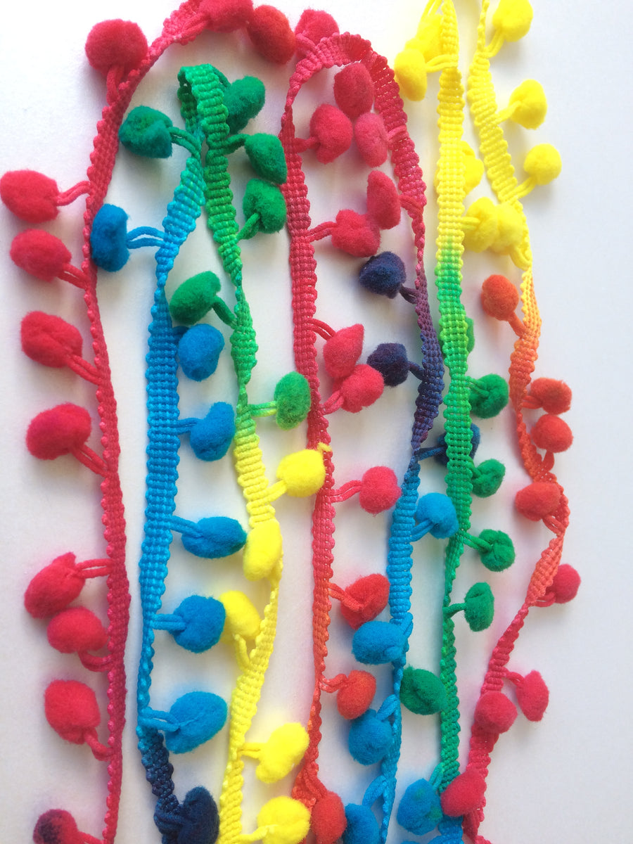 small primary coloured pom pom trim for a fun addtion to your projects