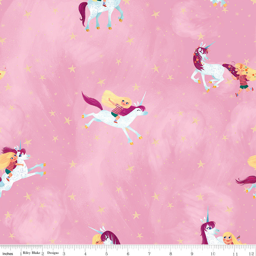 Riley Blake Unicorn fabric with a blonde girl riding a unicorn with golden stars dotted around.