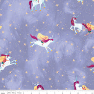 Riley Blake Unicorn fabric on a light purple background.  Blonde child playing and riding the unicorns with stars dotted around