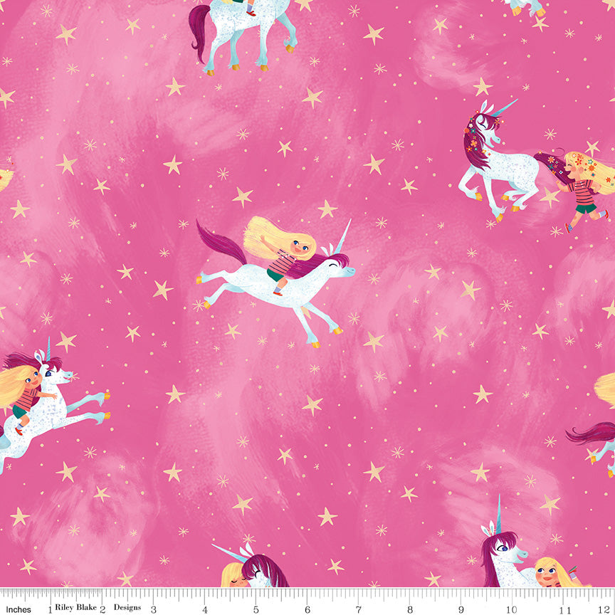 Riley Blake Unicorn fabric dark pink background with a blonde children playing and riding the unicorns