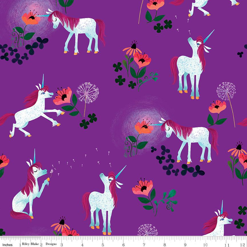 Riley Blake Unicorn fabric dark purple background with unicorns and flowers