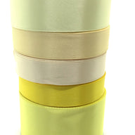 all creams and yellows stack of single faced ribbon for crafts and ribbon making