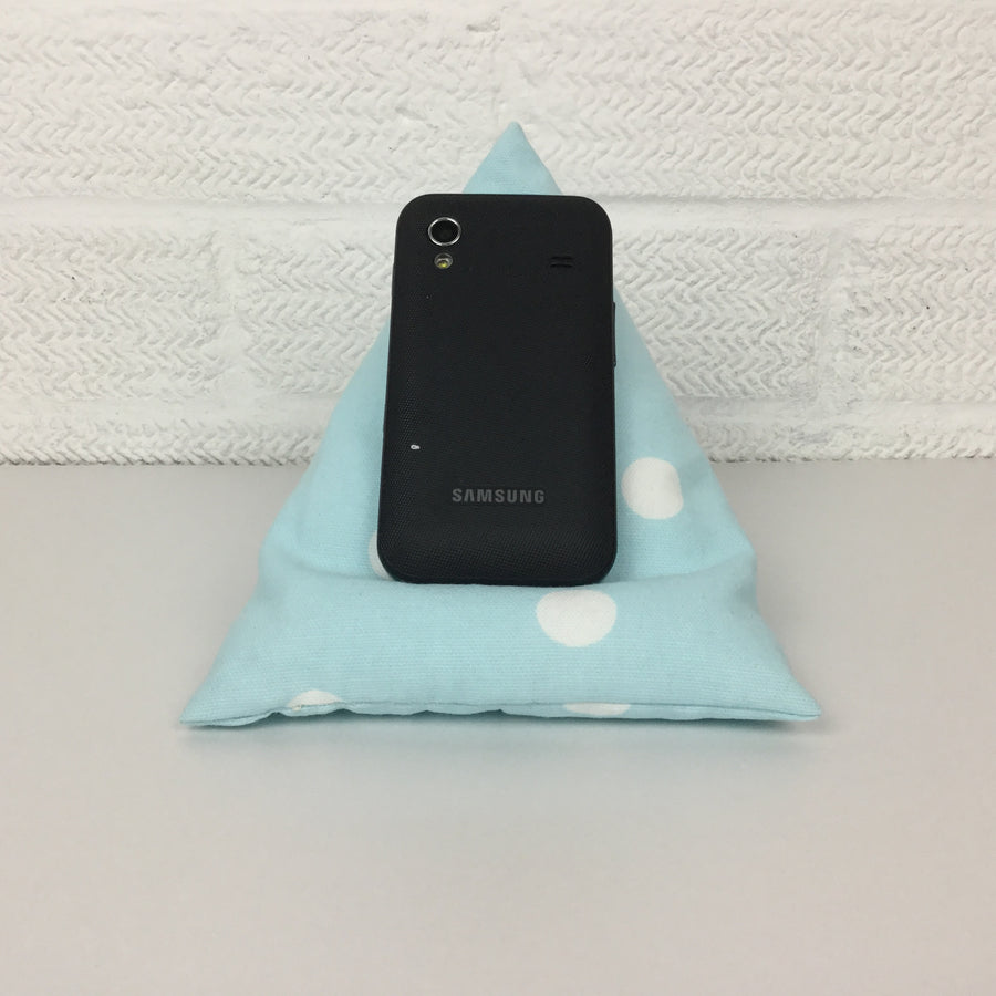 A handy little phone holder keeps your phone where you want it. Made from cotton canvas and filled with polystyrene beads it has a lovely feel