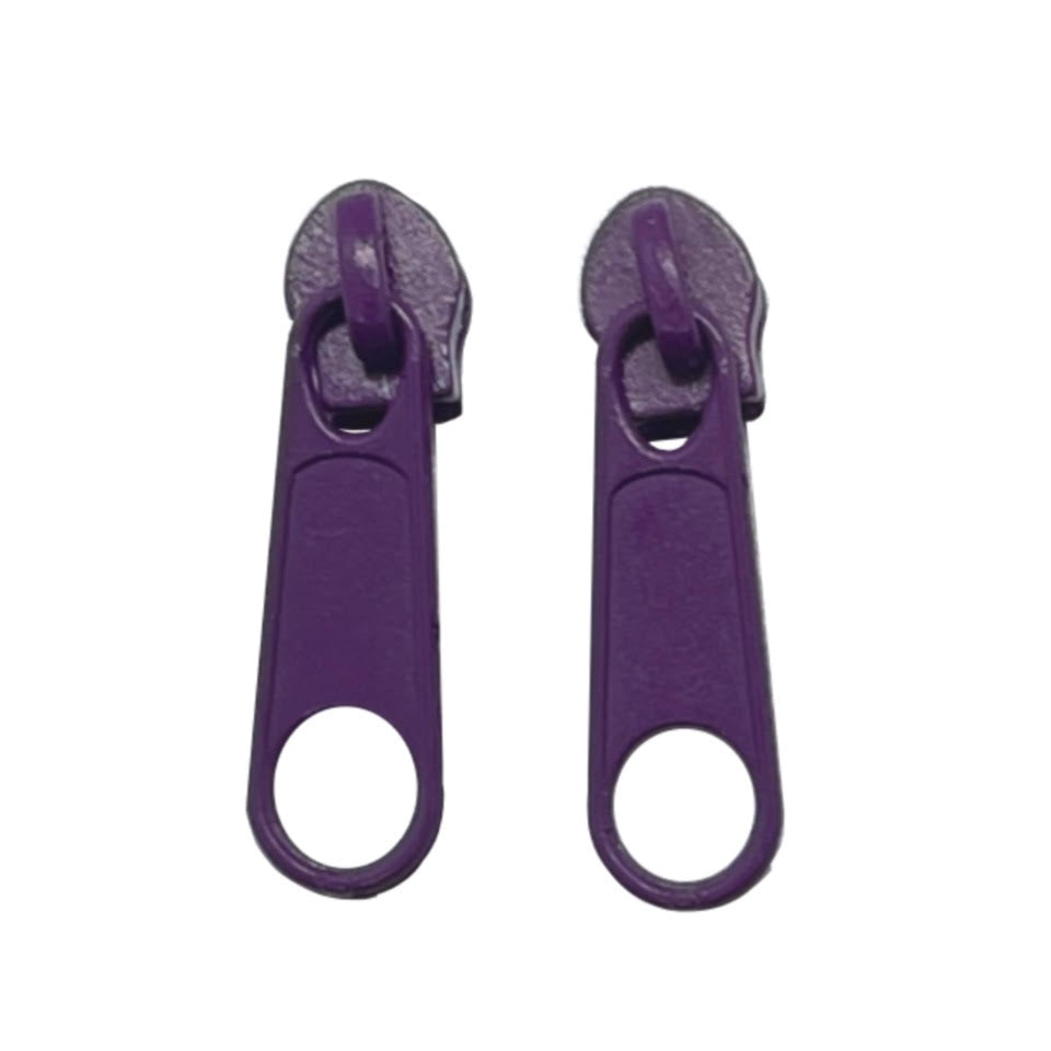 deep purple continuous zipper in the standard style with teeth coil exposed.