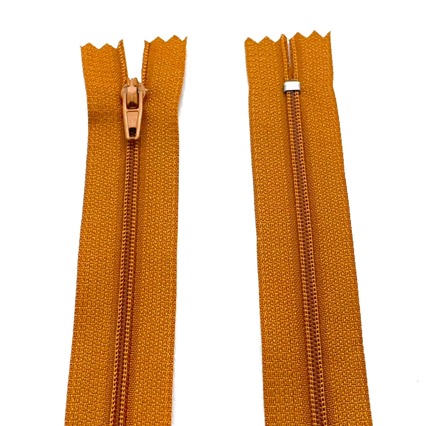 Photo of nylon zips available in 25 colors and 5 sizes. Excellent quality zippers for craft and dressmaking purposes. Perfect for dresses, skirts, trousers, bags, purses, cushions, and numerous other projects. So many possibilities, so little time!