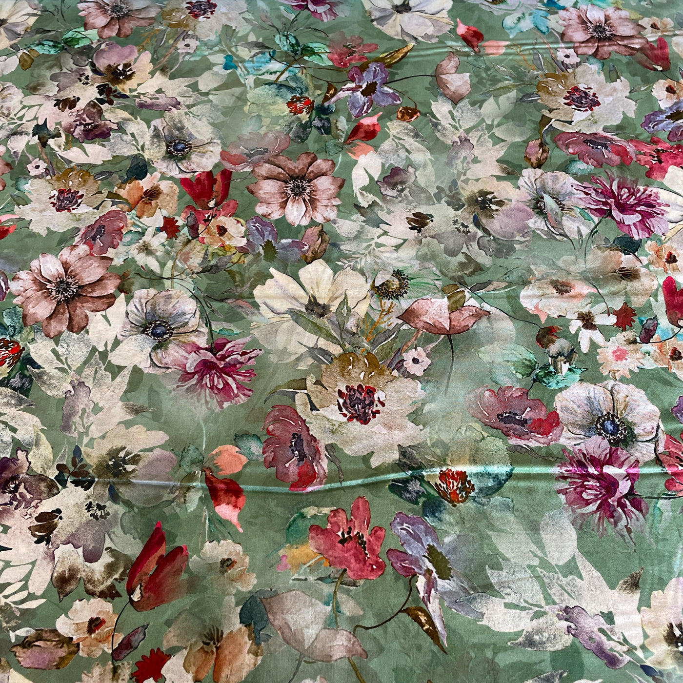 Luxurious sage green Digital Cotton Lawn floral prints are lightweight and soft with beautiful drape – perfect for dresses, blouses, skirts and crafts. At a width of 135cm / 53" and a weight of 75gsm