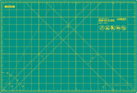 60cm x 45cm Olfa Self-healing, professional quality multi-purpose craft mat for 45cm x 30cm general cutting requirements.  Olfa cutting mat is the perfect mat when using Olfa rotary cutters or any Olfa cutting knives, Ideal for craft projects when cutting fabrics, paper, card, fabrics, fabric patterns,  etc... The cutting surface is self-healing and soft enough to protect the blade, at the same time the surface is hard enough to prevent deep incision, enabling the mat surface to self-healing