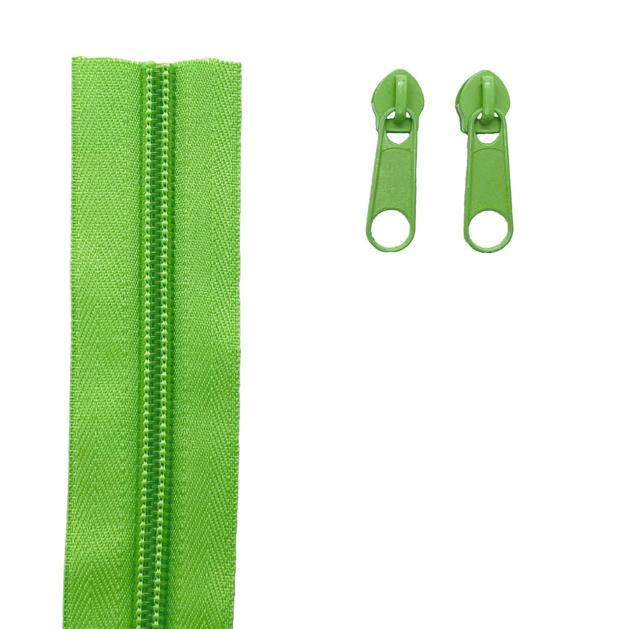 A bright green zipper shown vertically on the left, with two matching green zipper pull tabs on the right, photographed on a plain white background.