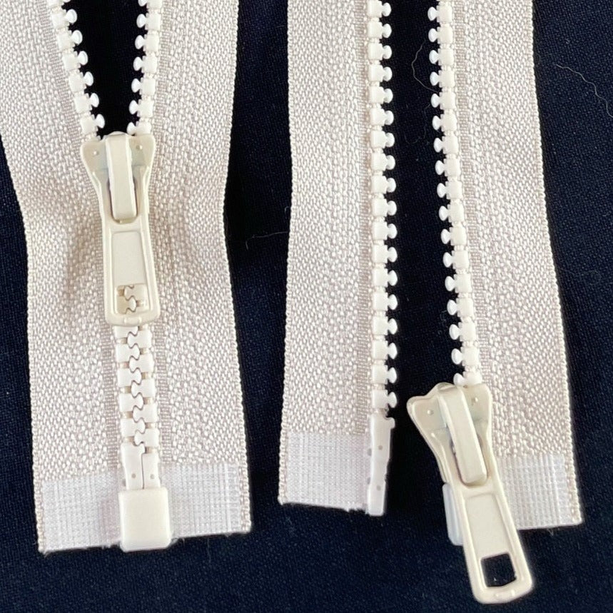 Beige neutral Chunky open-ended zippers in Size 5: Robust and reliable zippers designed for heavy-duty applications. The chunky design ensures durability and strength, suitable for projects requiring sturdy closures. With open-ended functionality, they offer accessibility and ease of use for jackets, bags, and outdoor gear. Size 5 provides ample width for secure fastening, making these zippers ideal for projects that demand both style and substanc