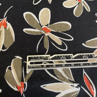 This fabric is a beautiful combination of linen, washed viscose, and black floral print. The linen provides a natural and breathable quality to the fabric, while the washed viscose adds a luxurious and soft touch. The black floral print adds a touch of elegance and femininity to the fabric.