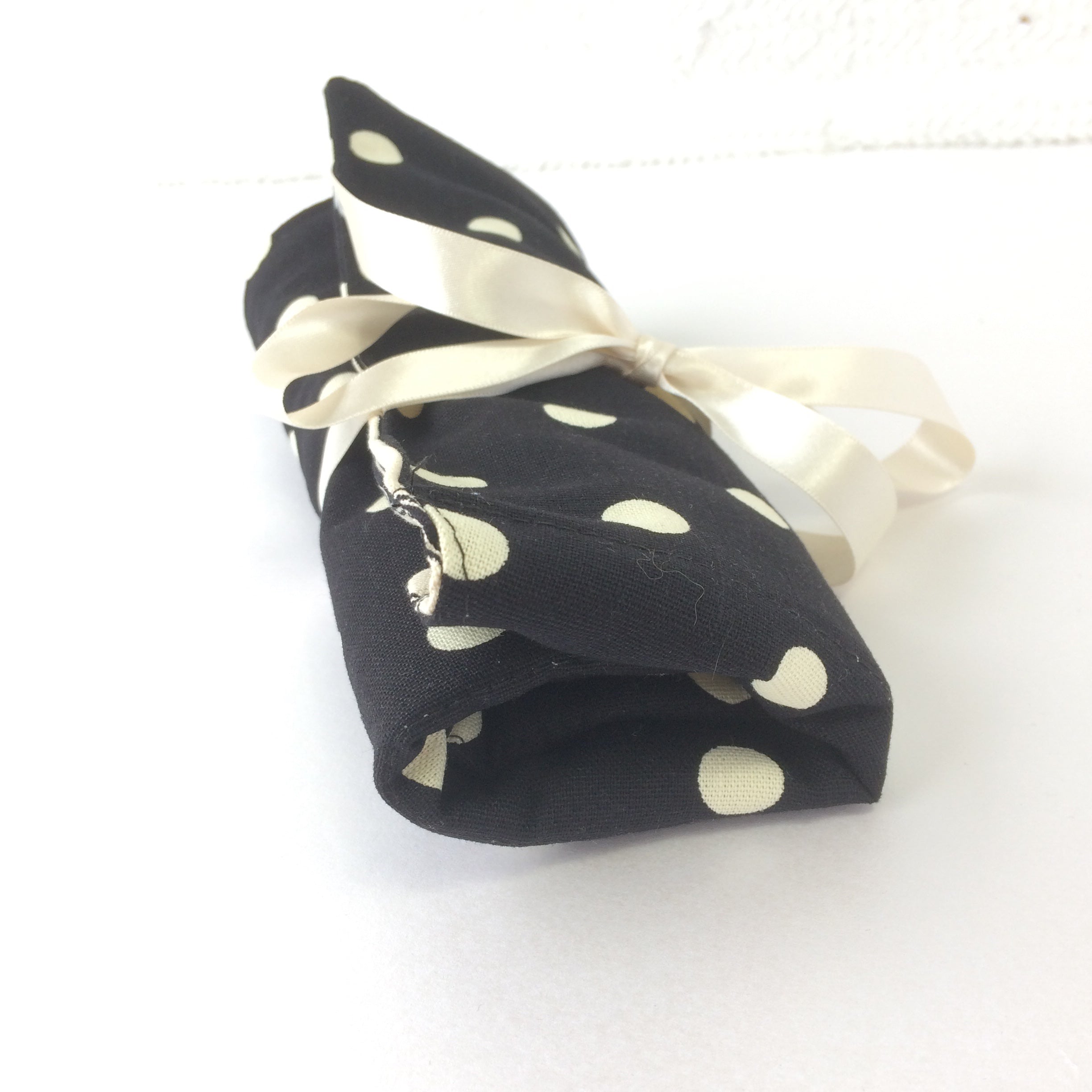 crochet hook roll all rolled up and secure
