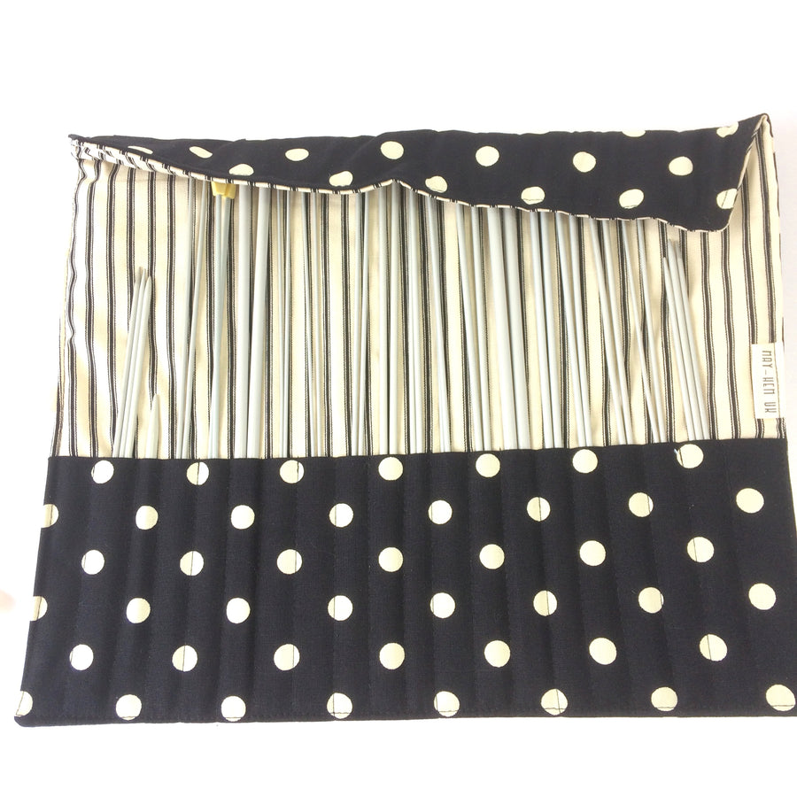 Knitting needle roll made from canvas with a spotted design