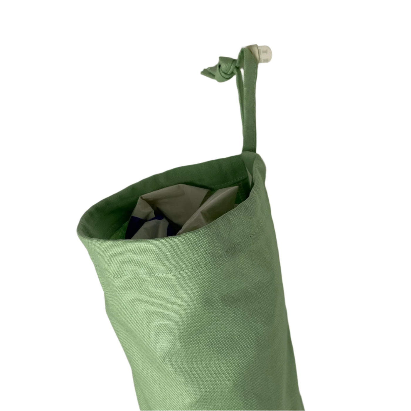 top of the green canvas plastic bag dispenser with drawstring