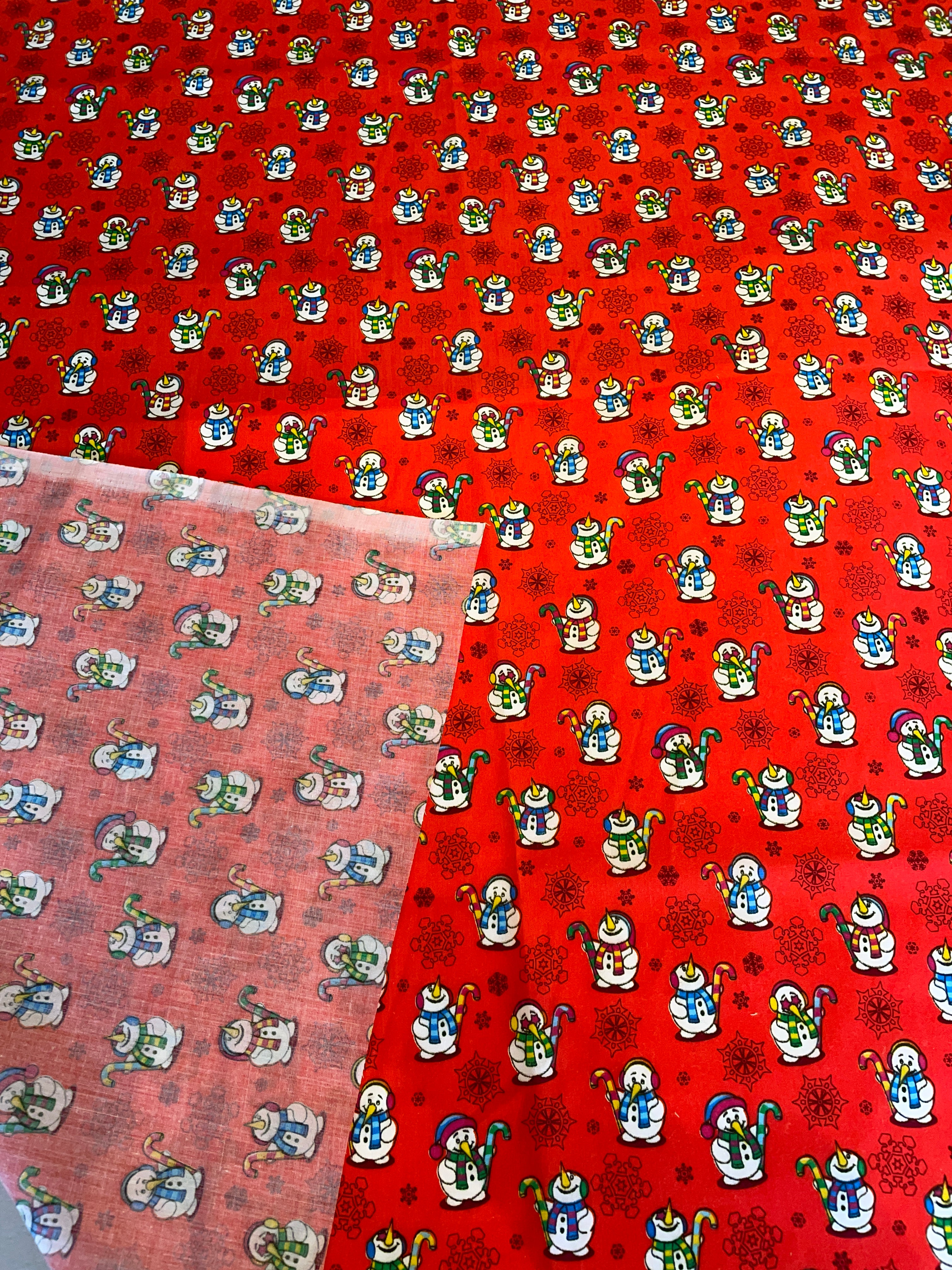 Red fabric with cartoon character pattern