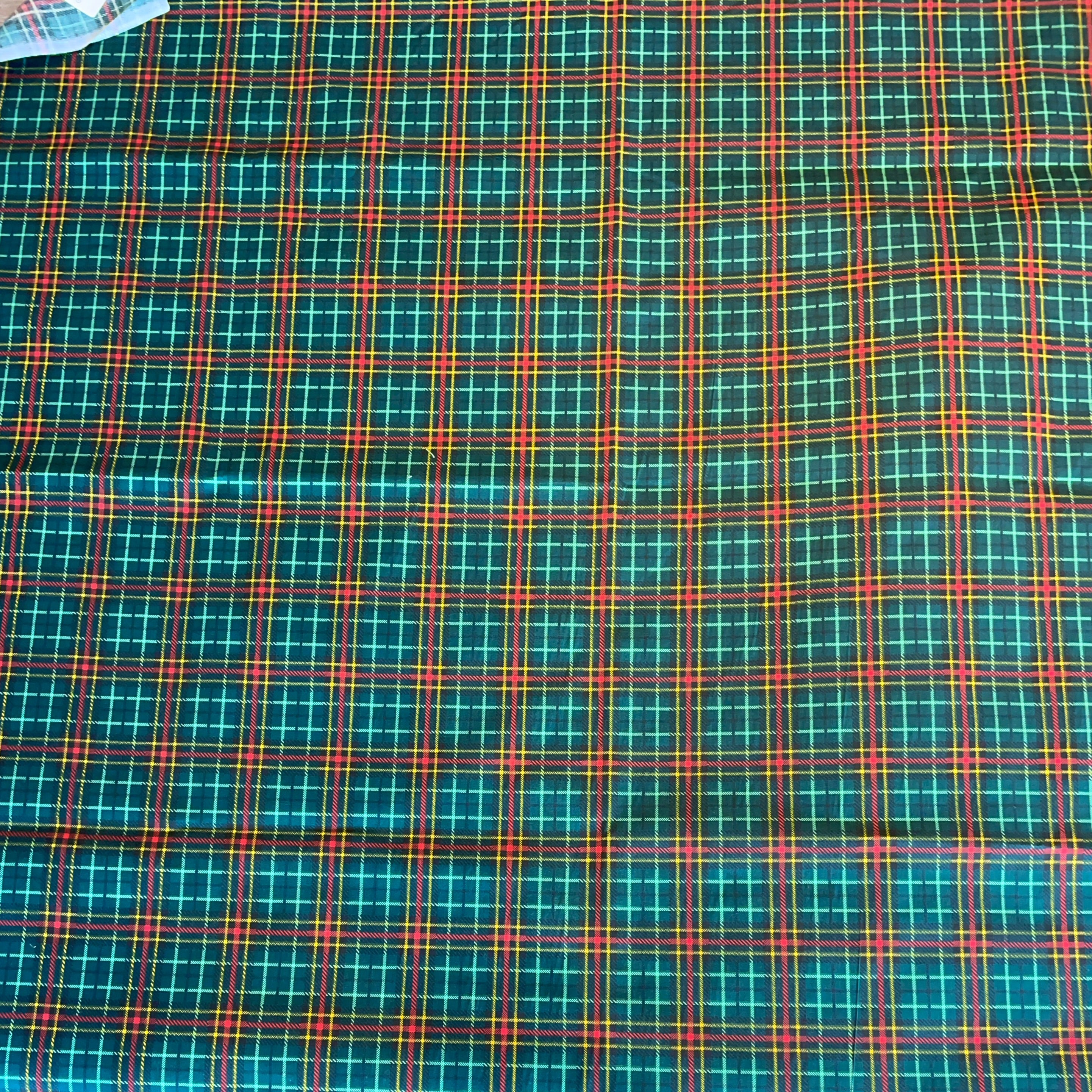 Plaid fabric with green, red, and blue pattern