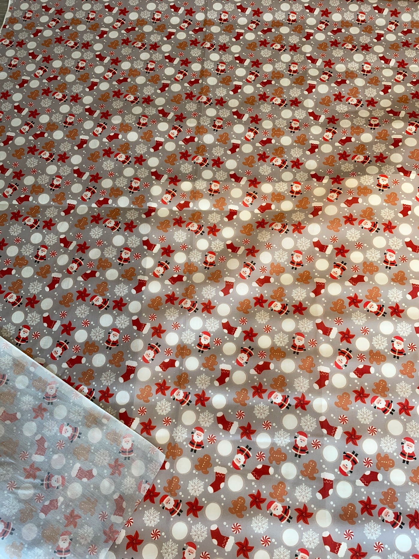 santa and stockings on a grey fabric background