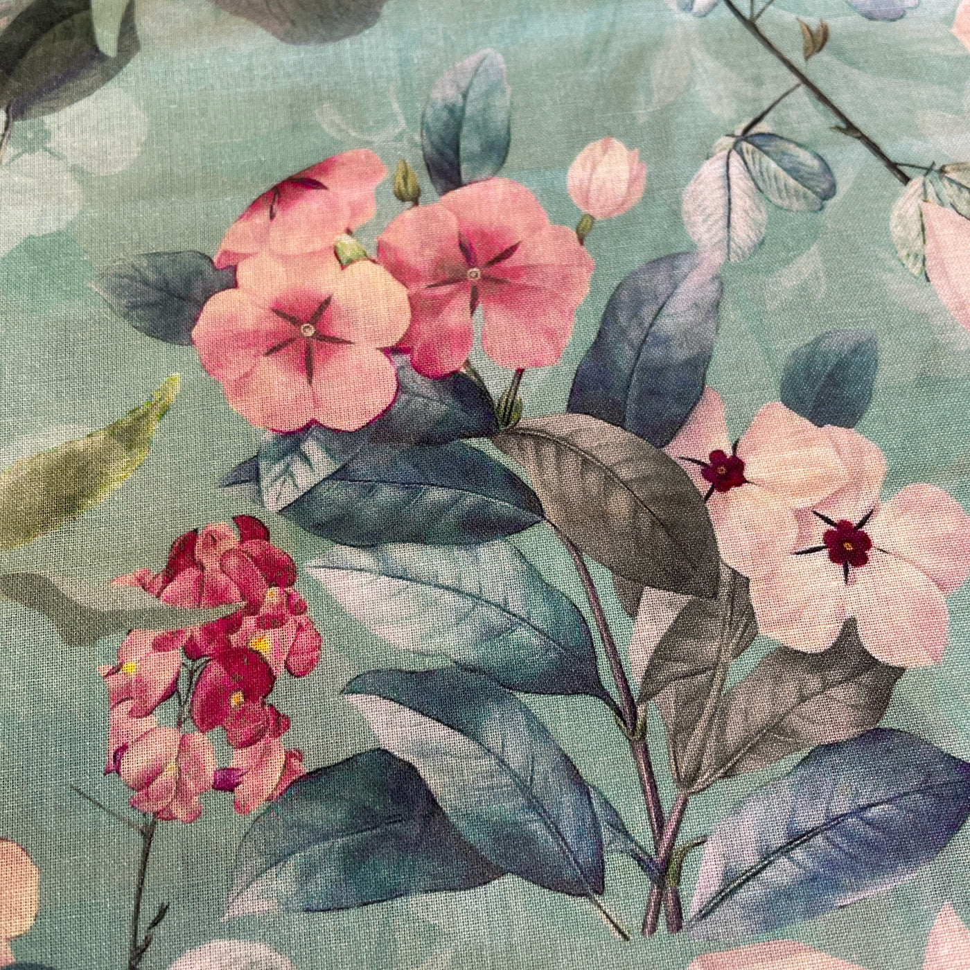 Luxurious aqua green Digital Cotton Lawn floral prints are lightweight and soft with beautiful drape – perfect for dresses, blouses, skirts and crafts. At a width of 135cm / 53" and a weight of 75gsm