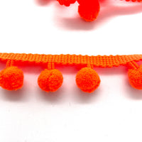 orange pom pom trim, embellish your hat, curtains, cushions