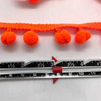 orange pom pom trim, embellish your hat, curtains, cushions