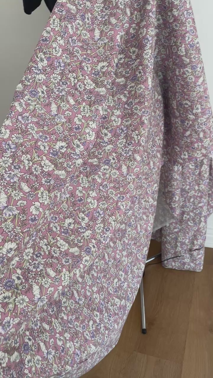 dusky rose cotton poplin with a floral pattern