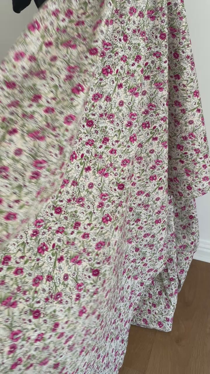white and pink cotton poplin with a floral pattern