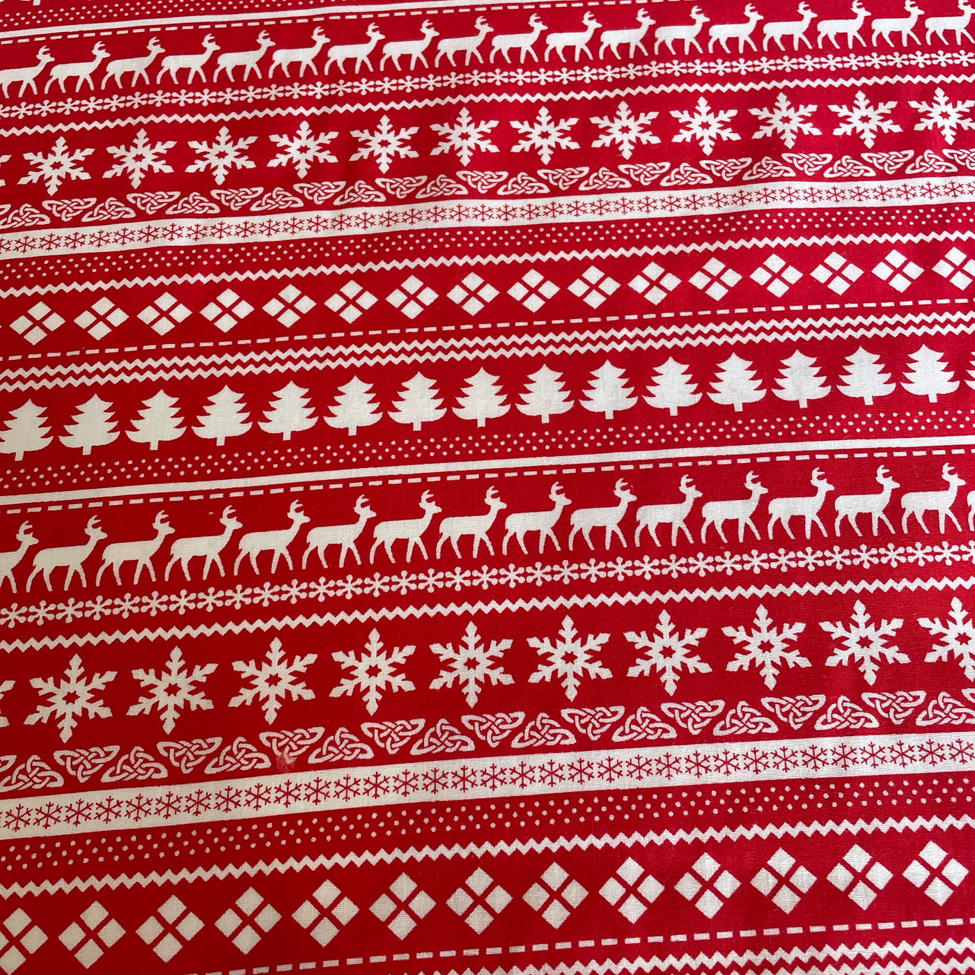 Red poly cotton scandanavian style fabric for traditional christmas projects