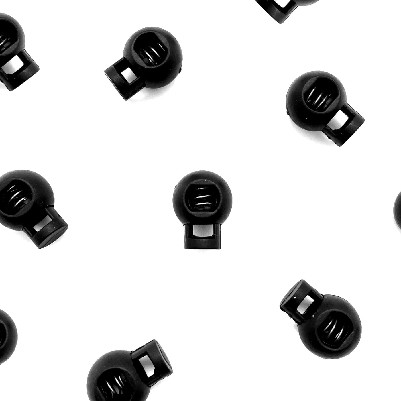 golfball style cord locks in black plastic