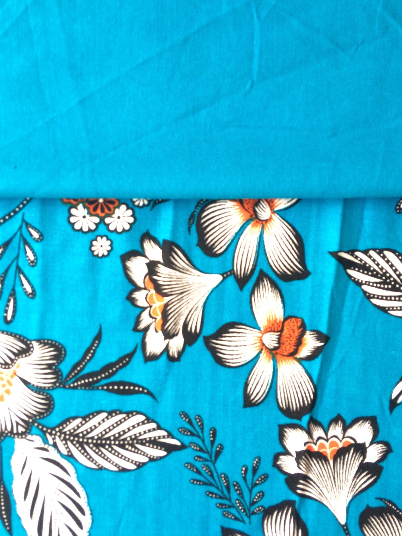turquoise floral viscose fabric with matching plain turquoise viscose