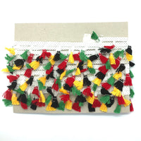 Black, yellow red and green tassle fringe trim