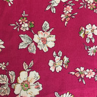 Cerise flowered viscose fabric for dressmaking