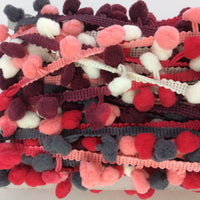 small pinks and greys coloured pom pom trim for a fun addtion to your projects