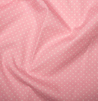 pink spotted cotton fabric by rose and hubble