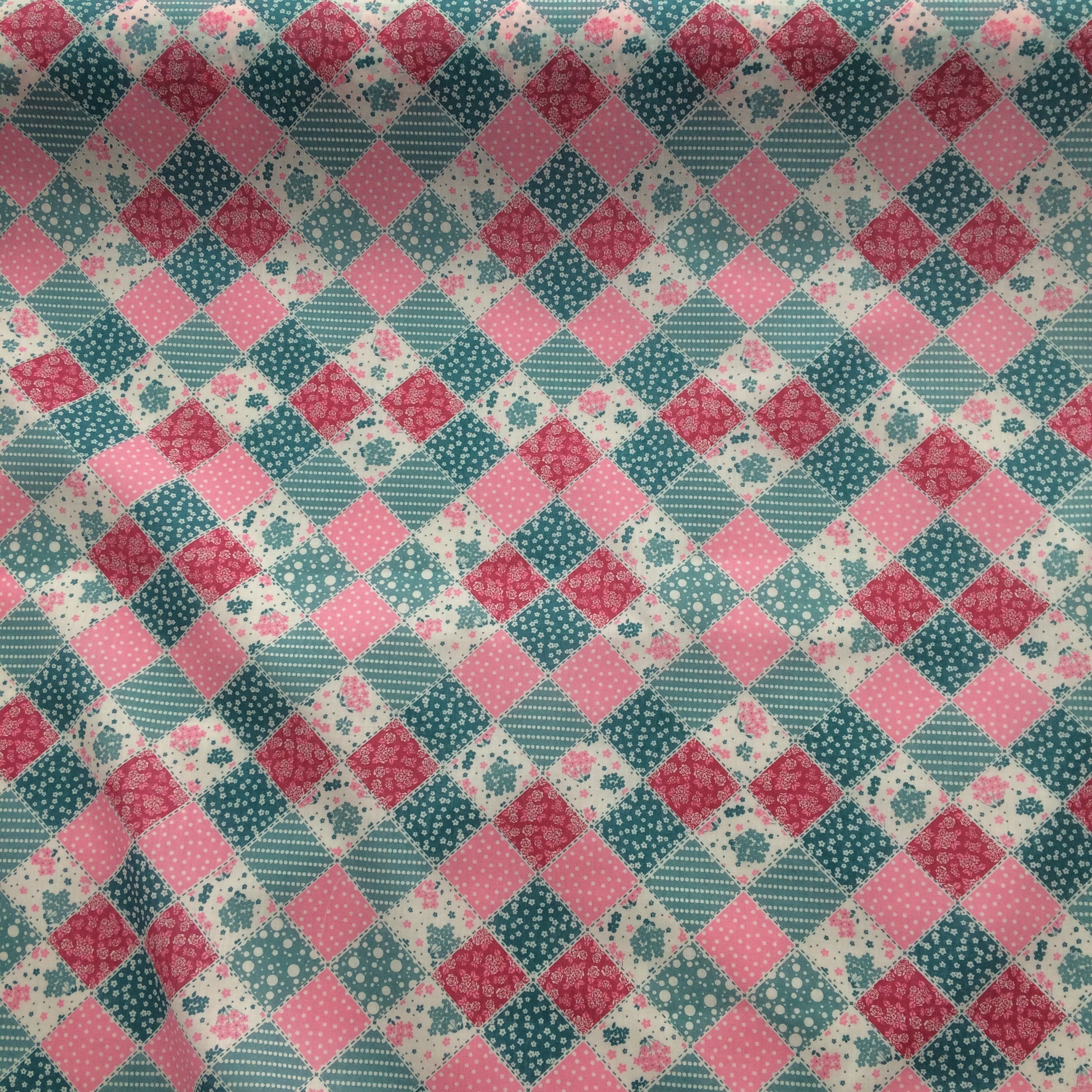 patchwork style polycotton fabric in pink and blue