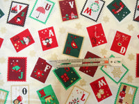 Christmas cotton fabrics with a festive stamps theme