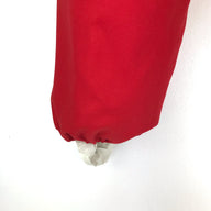 Red plastic bag holder dispenser with draw string