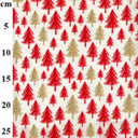 Glittery christmas trees on a cream background cotton fabric