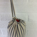 Grey Ticking fabric bag dispenser with draw string