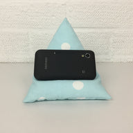 A handy little phone holder keeps your phone where you want it.&nbsp; Made from cotton canvas and filled with polystyrene beads it has a lovely feel