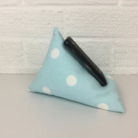 A handy little phone holder keeps your phone where you want it. Made from cotton canvas and filled with polystyrene beads it has a lovely feel