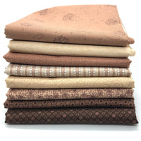 fabrics in various patterns of brown from the basically hugs collection by Red Rooster