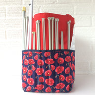 Red poppy knitting bag with side pockets for your needles and roomy inside for your projects