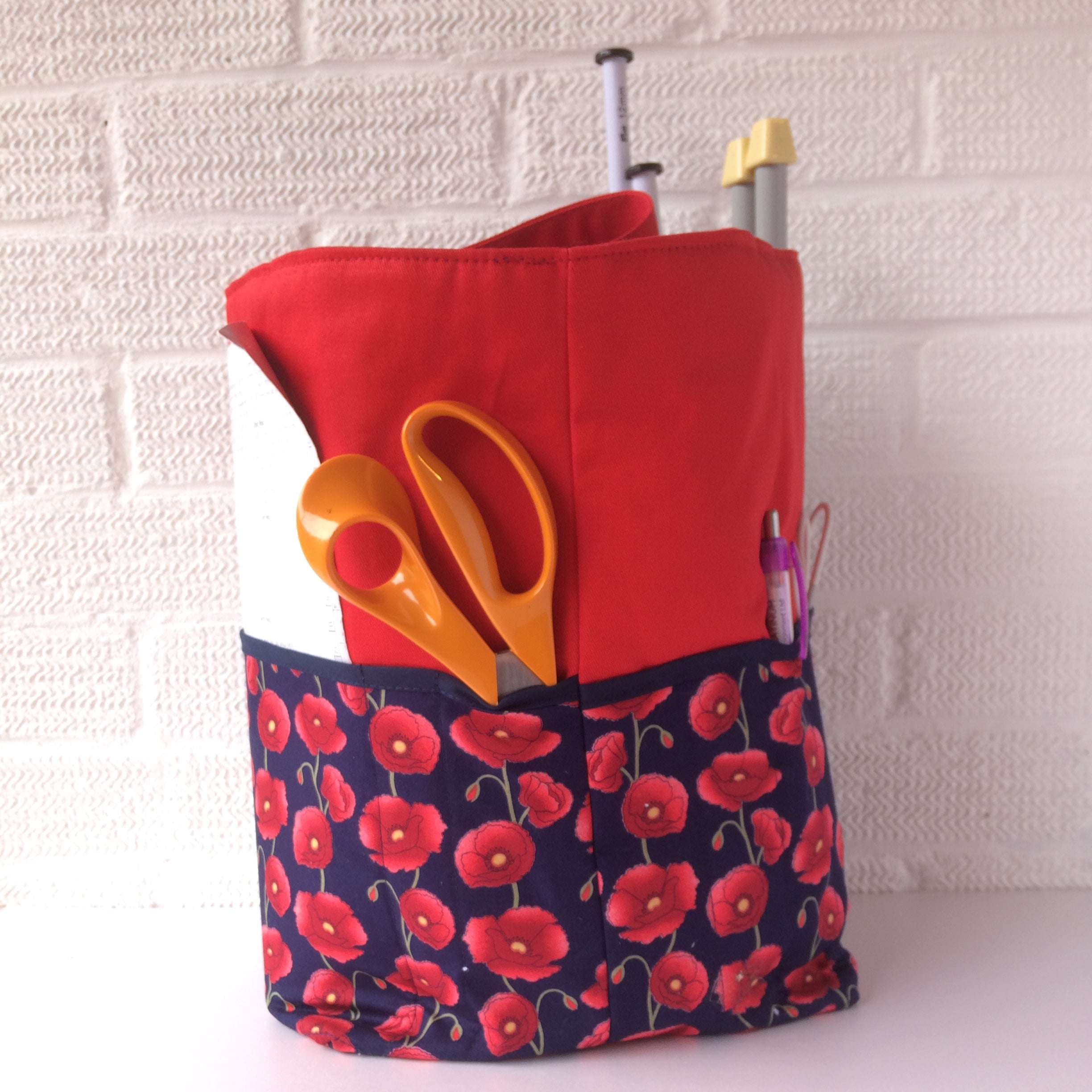 Red poppy knitting bag with side pockets for your needles and roomy inside for your projects