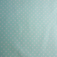 Mint spotted cotton fabric by rose and hubble