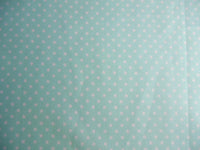 Mint spotted cotton fabric by rose and hubble